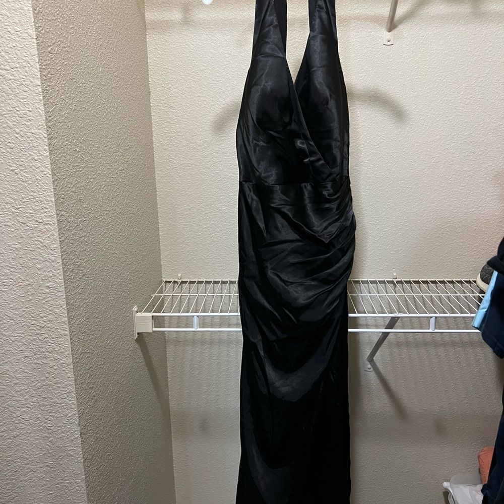 Bridesmaids dress, never worn. The dress is to big for me.